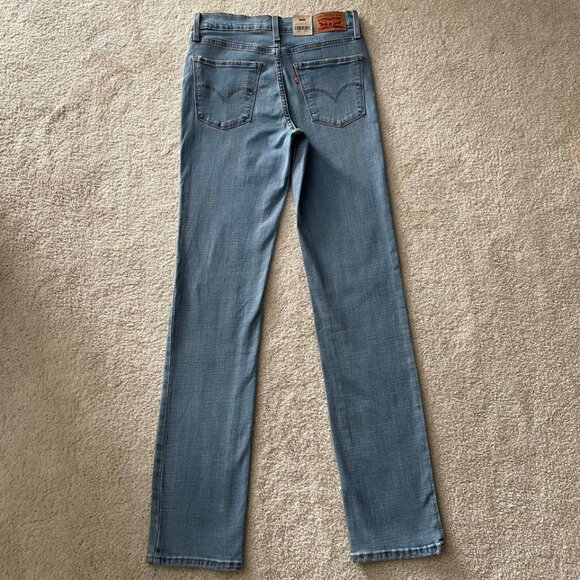 NWT Levi's 724 High Rise Slim Straight Distressed Jeans 27/32 Light Wash - Picture 8 of 13